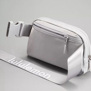 Lululemon everywhere belt bag word mark logo silver drop NWT